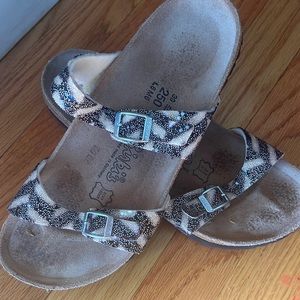Gently used black and white Birkenstocks